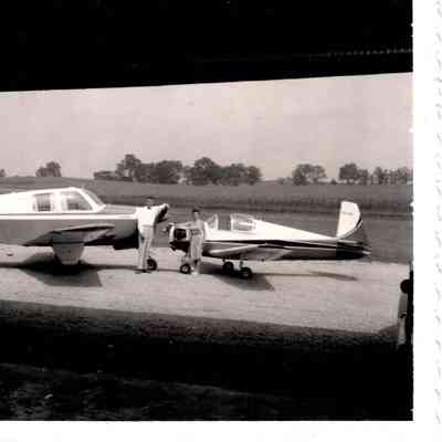 Mr. and Mrs. John Landrum are pictured with planes participating in the 10th Annual Kentucky Junior Chamber of Commerce. (1960)