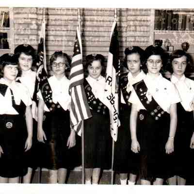Girl Scout Color Guard (1959) Pictured (L to R) are Sherrill Smartt, Kay Keightley, Sue Riley, Teena Roach, Mary Geo. Shewmaker, Audrey Parker, and Carolyn Carr.