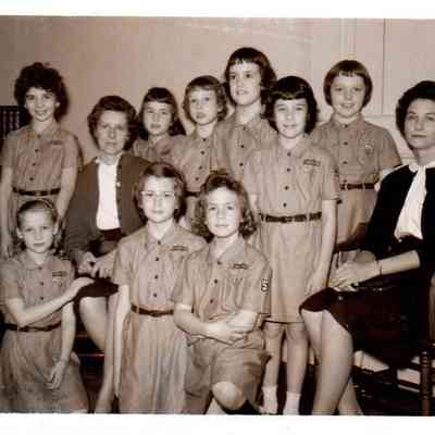 Brownie Troop No. 5. Pictured (L to R) on the front row are Jackie Woods, teresa Davis and Kay Sullivan. Standing in the back are Kathy Smith, Mrs Vilas Graham (leader), Becky Tatum, Cathy Graham, Helen Jo Trisler, Kay Lynn Gaskin, Jane Rue, and Mrs. Quentin Gaskin.