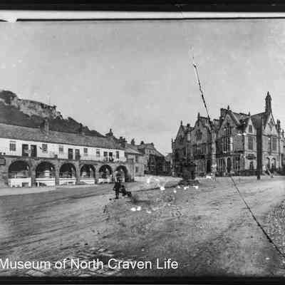 negative, glass plate - Settle Market Square (single story) - child being pulled along