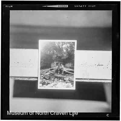 negative, sheet film - Portrait : Two women seated beside a mill wheel