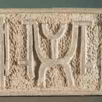 Votive of Stilt-Walkers