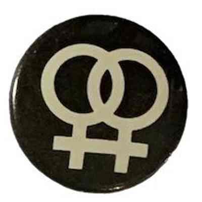 Double women’s symbols on black background