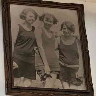 Kathy Lewis family in photo on Bloodroot wall: "On the left is Kathleen Dunn my mom’s best friend their whole lives and the woman I’m named after.  Mom (Anita Altermatt Lewis) is in the middle. My uncle’s wife Francis is on right."