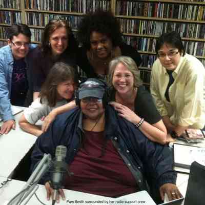 Pam Smith surrounded by her radio support crew - March 23, 2012: Back: Sue Denis, Valerie Richardson, Cheryl Palmer, Colette Rossignol | Front: KC Ryan, Pam Smith, Deb Guhl | Sue Denis was Pam’s sidekick (and partner). The rest were all WPKN programmers.