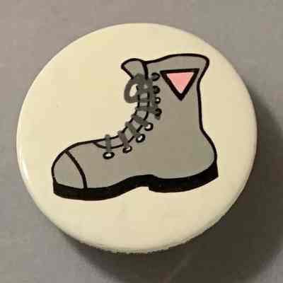 Boot with pink triangle