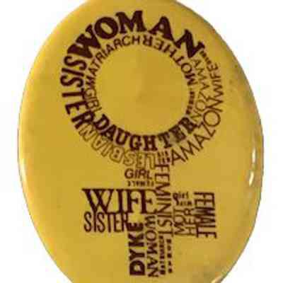 Woman symbol with word cloud: Woman, Amazon, Sister, Matriarch, Wife, girl, Dyke, Female, etc.