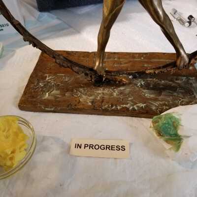 Process: Using de-corroder on base, green shows sign of corrosion