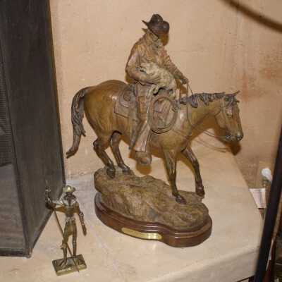 Cowboy and Dog on Horseback