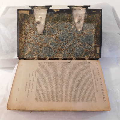 Before treatment: 2 nails in the book and damaged cords