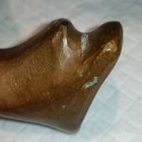          Green copper corrosion on feet
