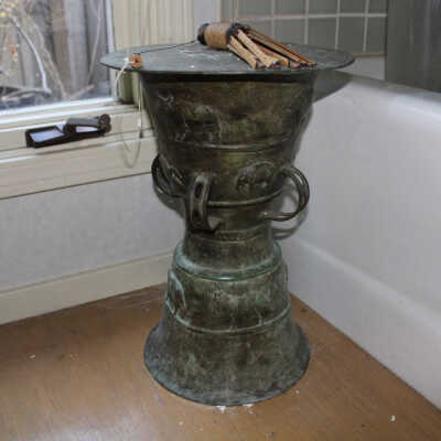 Bronze sculpture with tassel