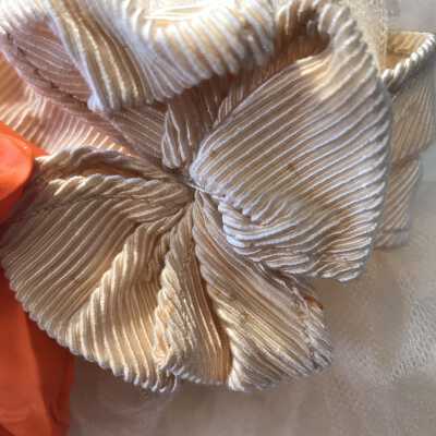 Staining on right sleeve bow