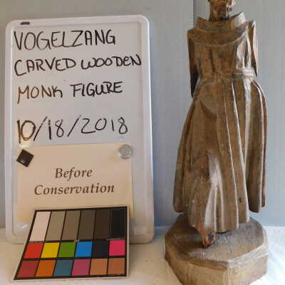 Santos "Monk" Figure