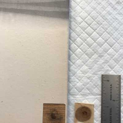 Removed square of discoloured paper revealing nail; this also showed that the paper is only glued to the board on the sides, not the face of the work, therefore it will be able to be removed from the wooden stretcher and problematic nails. 
