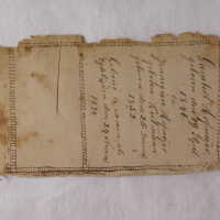          Before treatment; The second loose leaf with tears and broken edge (back side)
