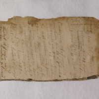          Before treatment; Loose fly leaf with broken edge(back side)
