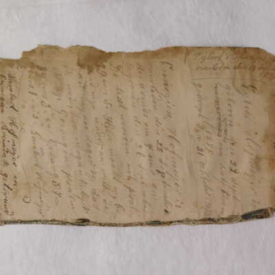 Before treatment: Loose fly leaf with broken edge(back side)