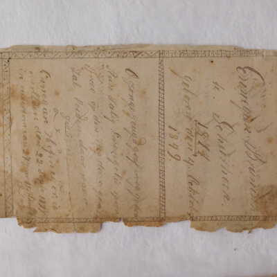 Before treatment: The second loose leaf with tears and broken edge (front side)