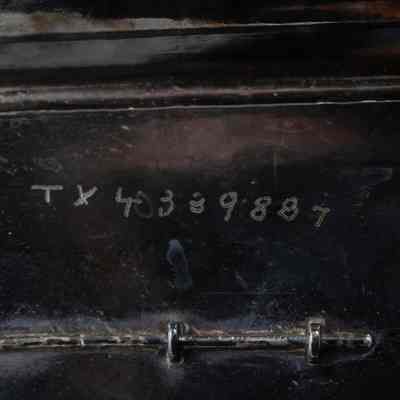 Engraving on stands: Engraved in the bottom of the stand, along with other stamps, "TX 4339887."