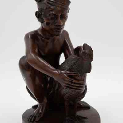 Carved Wooden Squatting Cockfighter with Cock Figurine