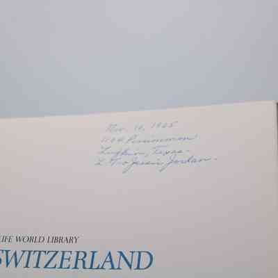 Inside Signature: Inside “Switzerland” is writing in blue pen which reads "Nov 10, 1965 1104 Persimmon Lufkin, Texas. L.T. & Jessie Jordan."