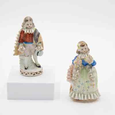 Pair of Painted Children Japanese Porcelain Figurines in Colonial Dress