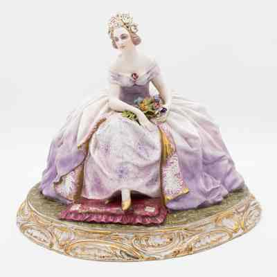 Large Lavender Dressed Porcelain Figurine of a Woman on a Gold Base