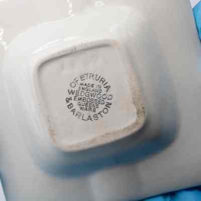 Bottom of ashtrays: The bottom of the ashtrays has "Wofetruria & Barlaston. Made in England; Wedgwood; Embossed queens ware."