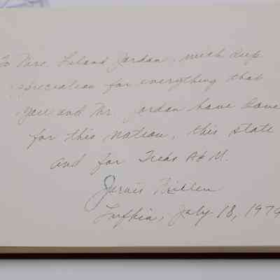 Inside Signature: Inside “Buck Schiwetz' Memories” is writing in faded black ink. It reads "To Mrs. Leland Jordan, with duly appreciation for everything that you and Mr. Jordan have done for this nation, this state and for Texas A&M. Jason Thielen Lufkin, July 18, 1979"