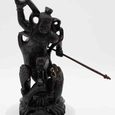 Carved Black Ebony Figurine of Man with Spear and Sea Monster