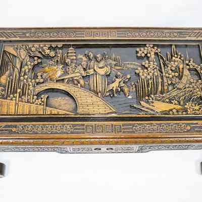 Top of coffee table: The coffee table features intricate carvings and elegantly curved legs, showcasing exquisite craftsmanship.