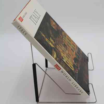 Spine of "Italy": The spine of "Italy" features the book title and the creator of the book.