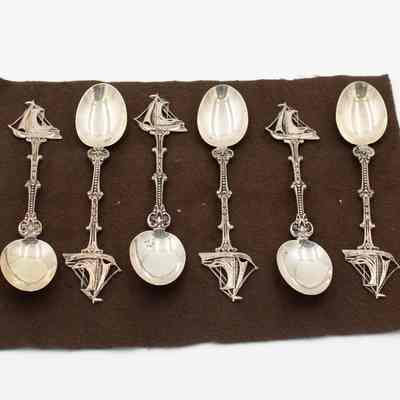 Spoon set: A set of six Dutch sterling silver spoons features sailboat handles.