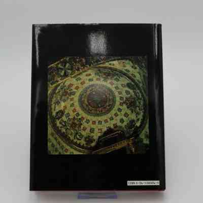 Back cover of "Art and Time in Mexico": The cover has a black background with a colored photograph of the interior of Iglesia de San Jerónimo Tlacochahuaya, located in Oaxaca, Mexico.