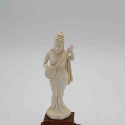 Ivory Figurine of Woman Holding Stringed Instrument