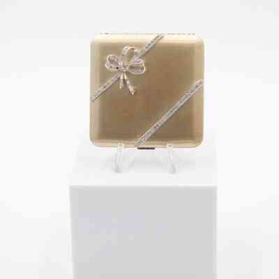 Gold and Silver Jeweled Compact with Bow Decoration