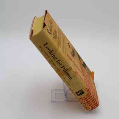 Spine of "Looking for Dilmun": The spine of the book includes the title, author and publisher.
