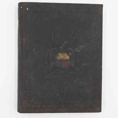 1927 yearbook: The image displays a dark-colored yearbook from 1927 with an embossed Texas A&M University seal.