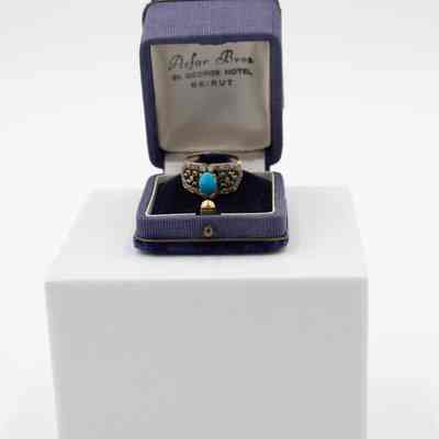 Silver and Gold Ring with Diamonds and Turquoise in Purple Box