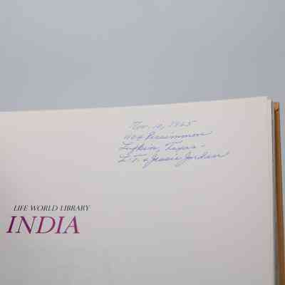 Inside Signature: Inside “India” is writing in blue pen which reads "Nov 10, 1965 1104 Persimmon Lufkin, Texas. L.T. & Jessie Jordan."
