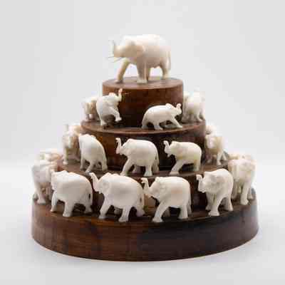 Wooden Pyramid with Carved Ivory Elephants