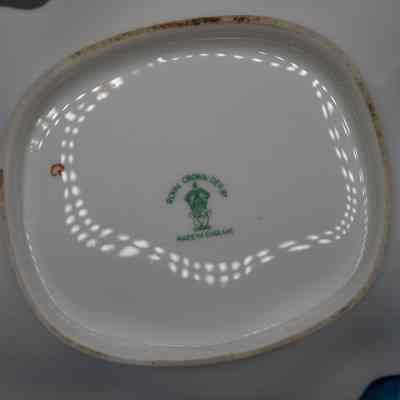 Bottom of dish: Green stamp on bottom of dish, "Royal Crown Derby; Made in England."
