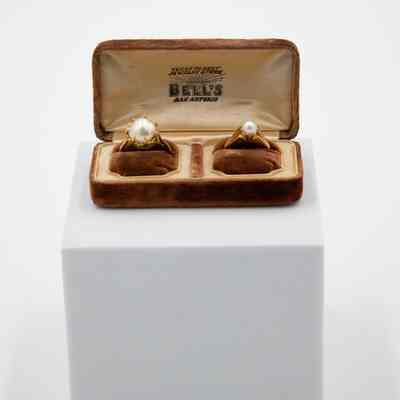 Set of Gold and Pearl Rings with Brown Felt Case