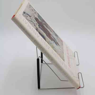 Spine of "Nature and Animals": The spine features the names "Arve Moen," and "Edvard Munch," along with the title.