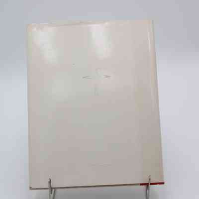 Back cover of "Nature and Animals": The back cover is almost solid white, with a small gray logo of a crane-like bird.
