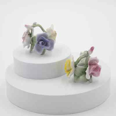 Pair of Painted Ceramic Rose Candleholders