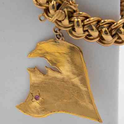 Charm of Kuwait on the bracelet given to Mrs. Jessie Jordan by His Highness Sheikh Ahmad Al Jaber Al Sabah.: Up close image of the charm of Kuwait. The charm shows the location of Ahmadi, denoted by a small ruby and star.