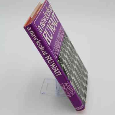 Spine of "A New Look at Kuwait": The spine has text vertically up the purple side, "A New Look at Kuwait; Zahra Freeth; George Allen & Unwin"