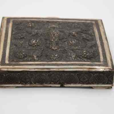 Large Persian silver shallow square box with lid.: Image of the large Persian silver square box decorated with floral leaf motif.